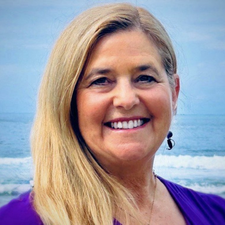 Nancy Miller, host of the Moving to Hawaii course, photographed on the Big Island coast